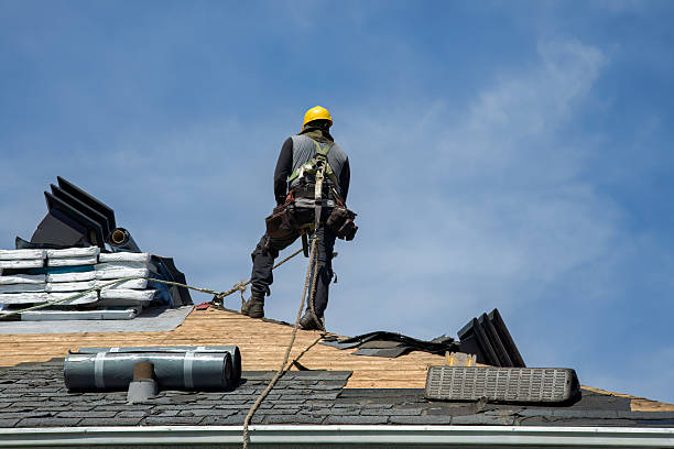 Professional Gutter Installation technician working in Lexington, MA